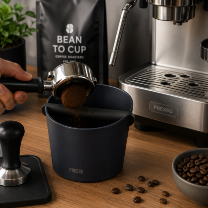 Presso Espresso Knock Box beside coffee machine